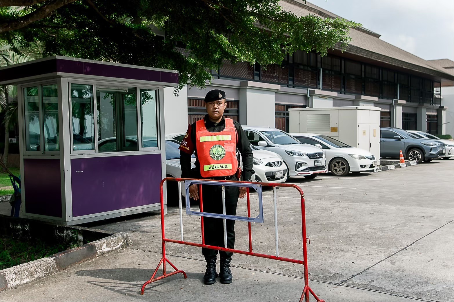 Security officer directing traffic