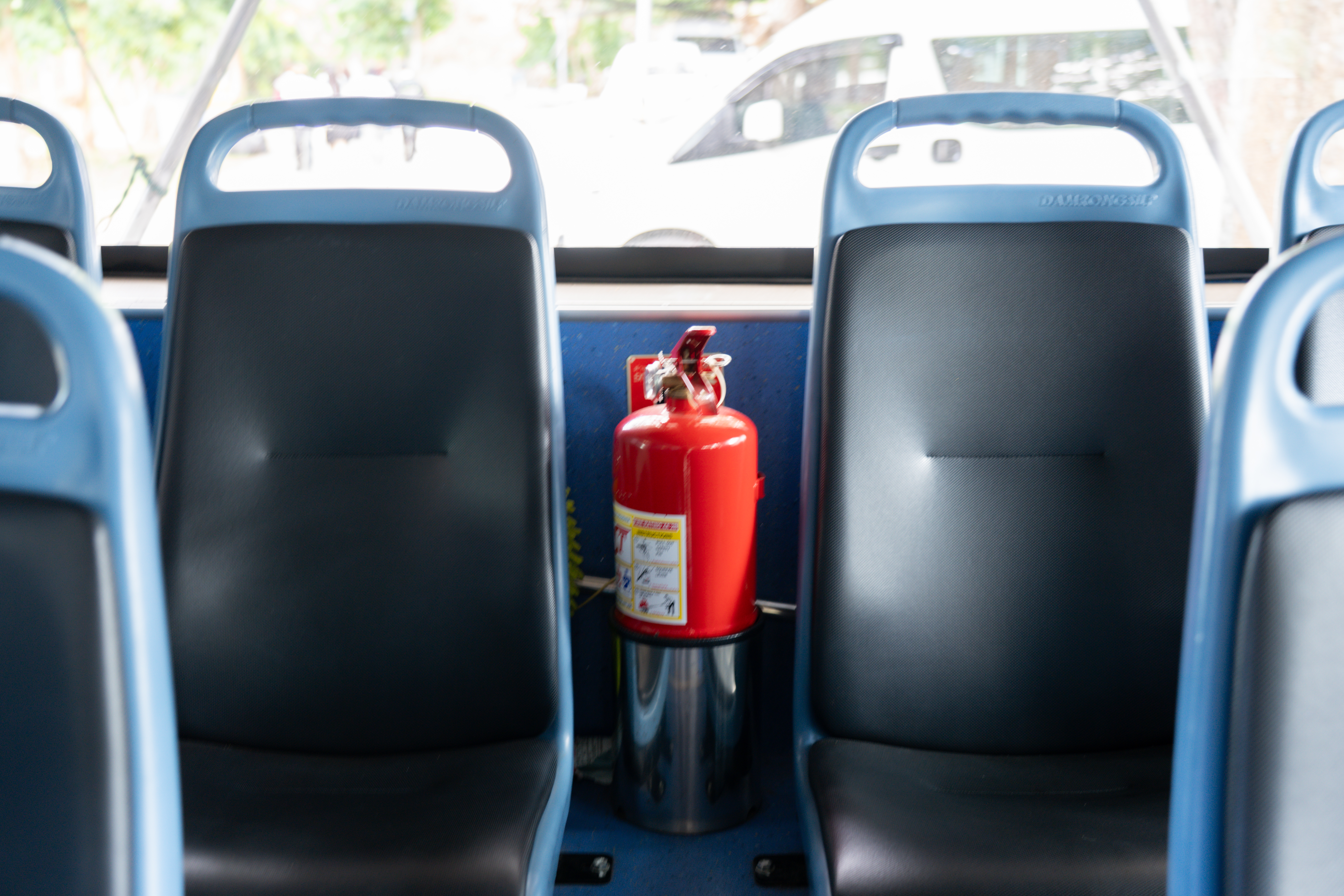 Fire extinguisher on electric bus