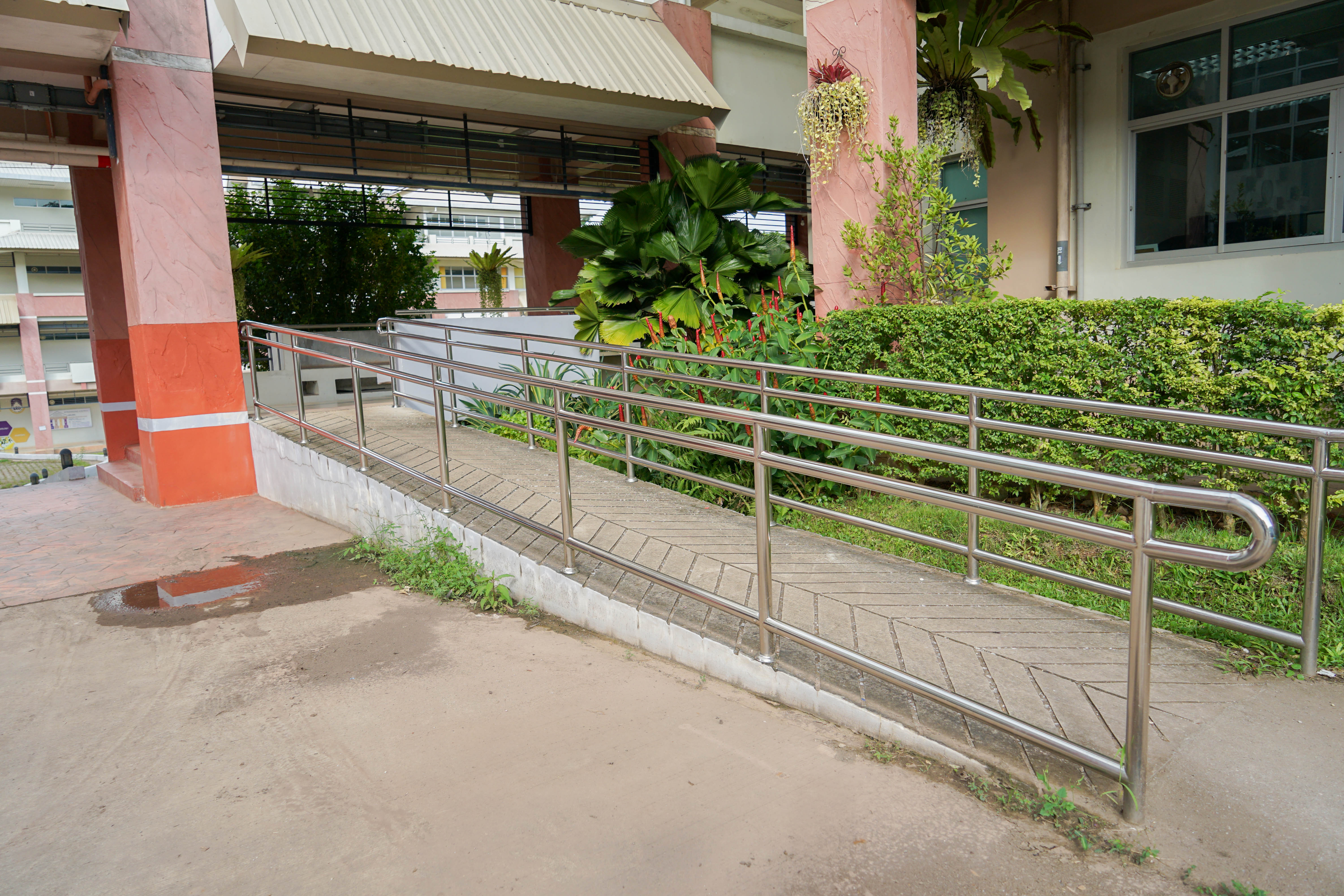 Wheelchair ramp for persons with disabilities