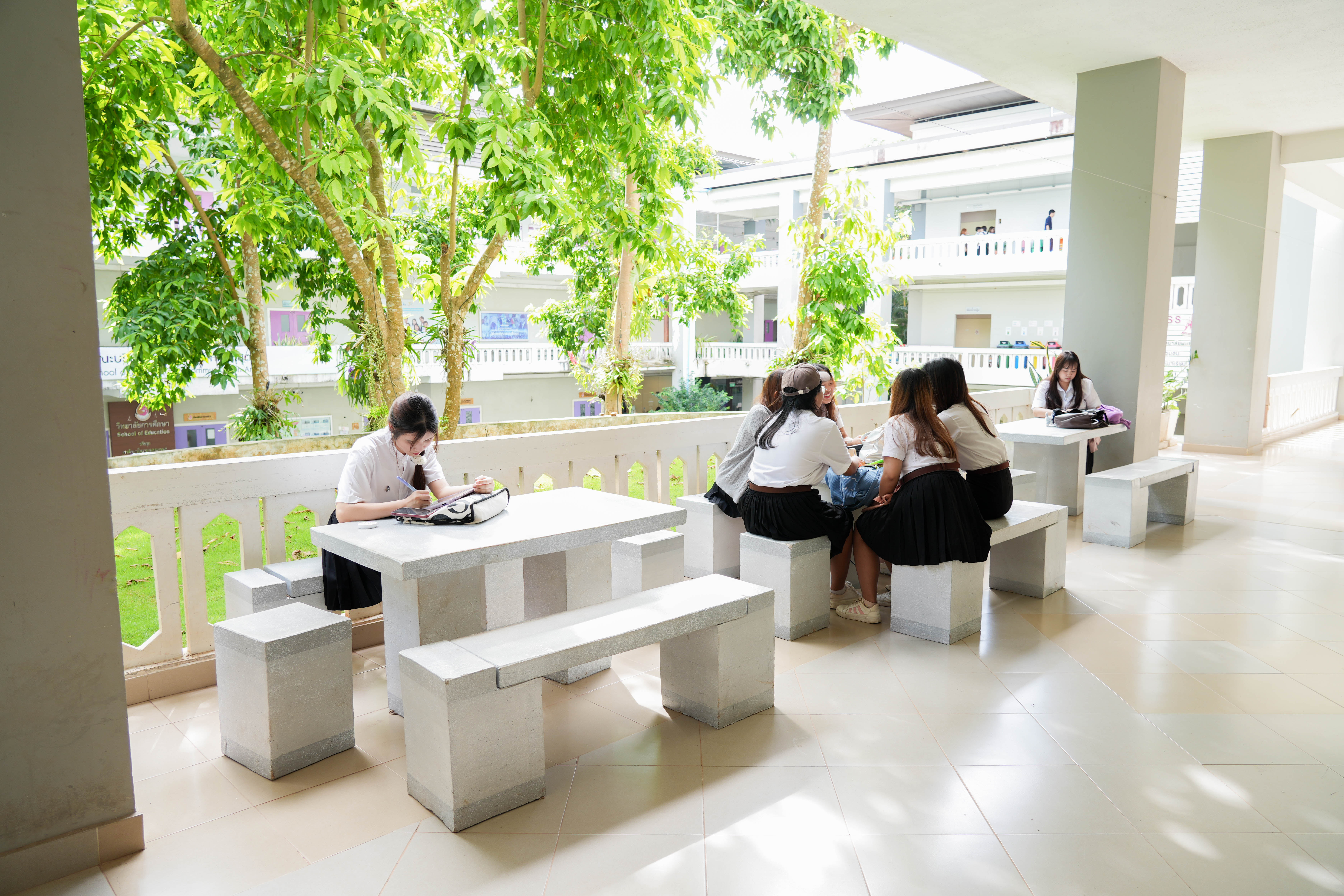 Seating area near pond under building